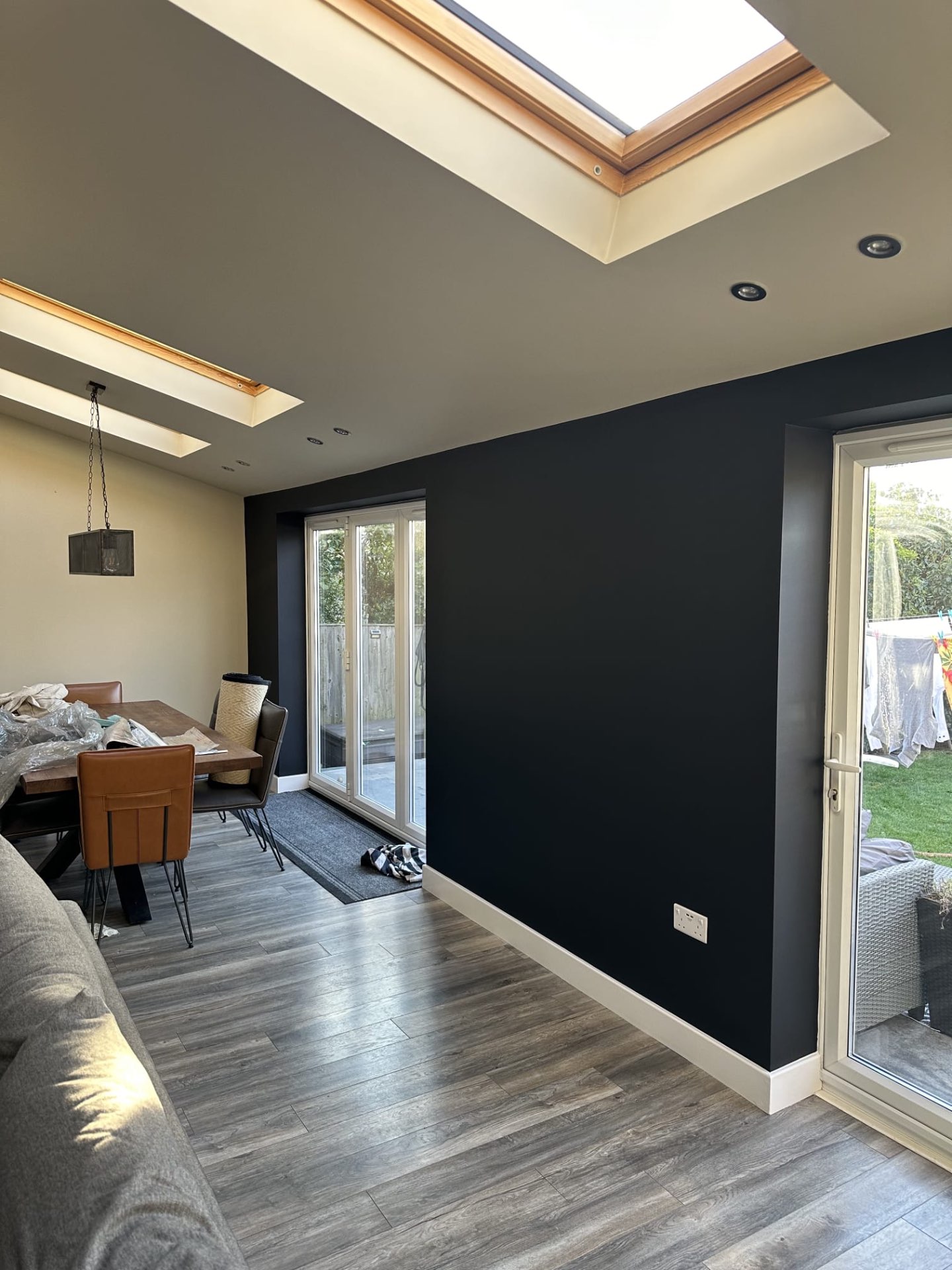 Navy feature wall in a kitchen extension