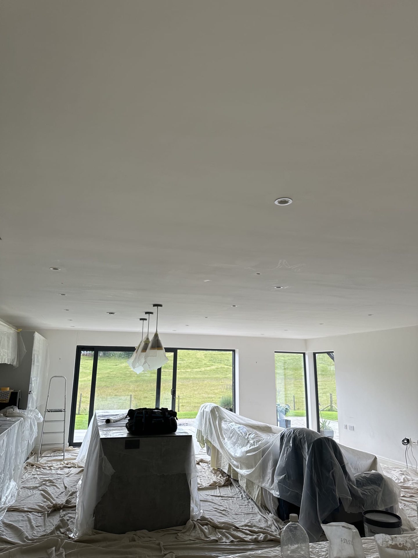 Freshly painted open plan kitchen ceiling