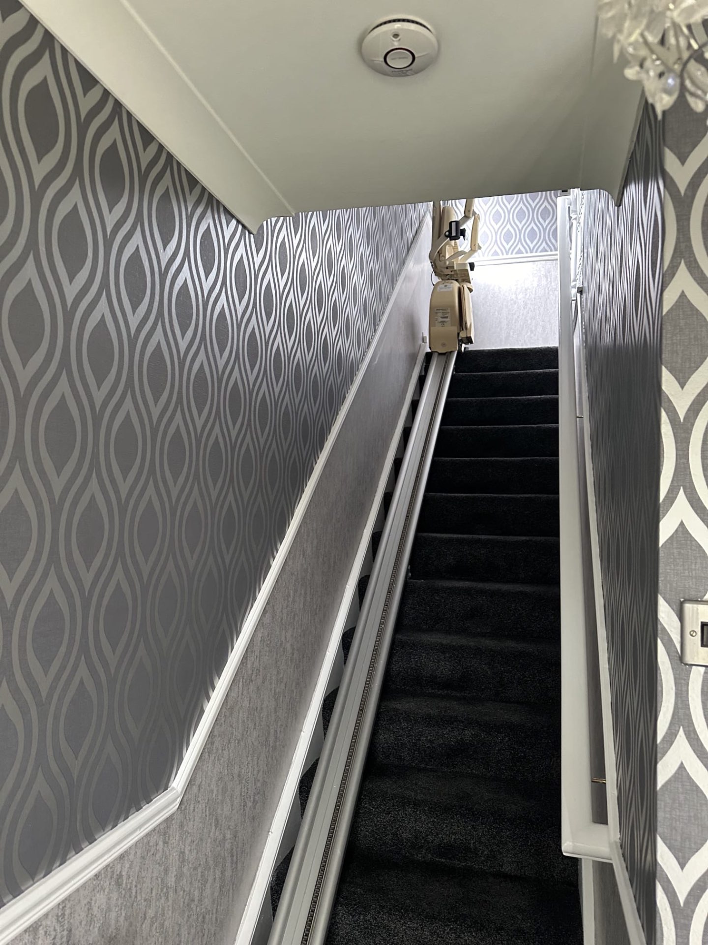 Stairway with fresh patterned wallpaper