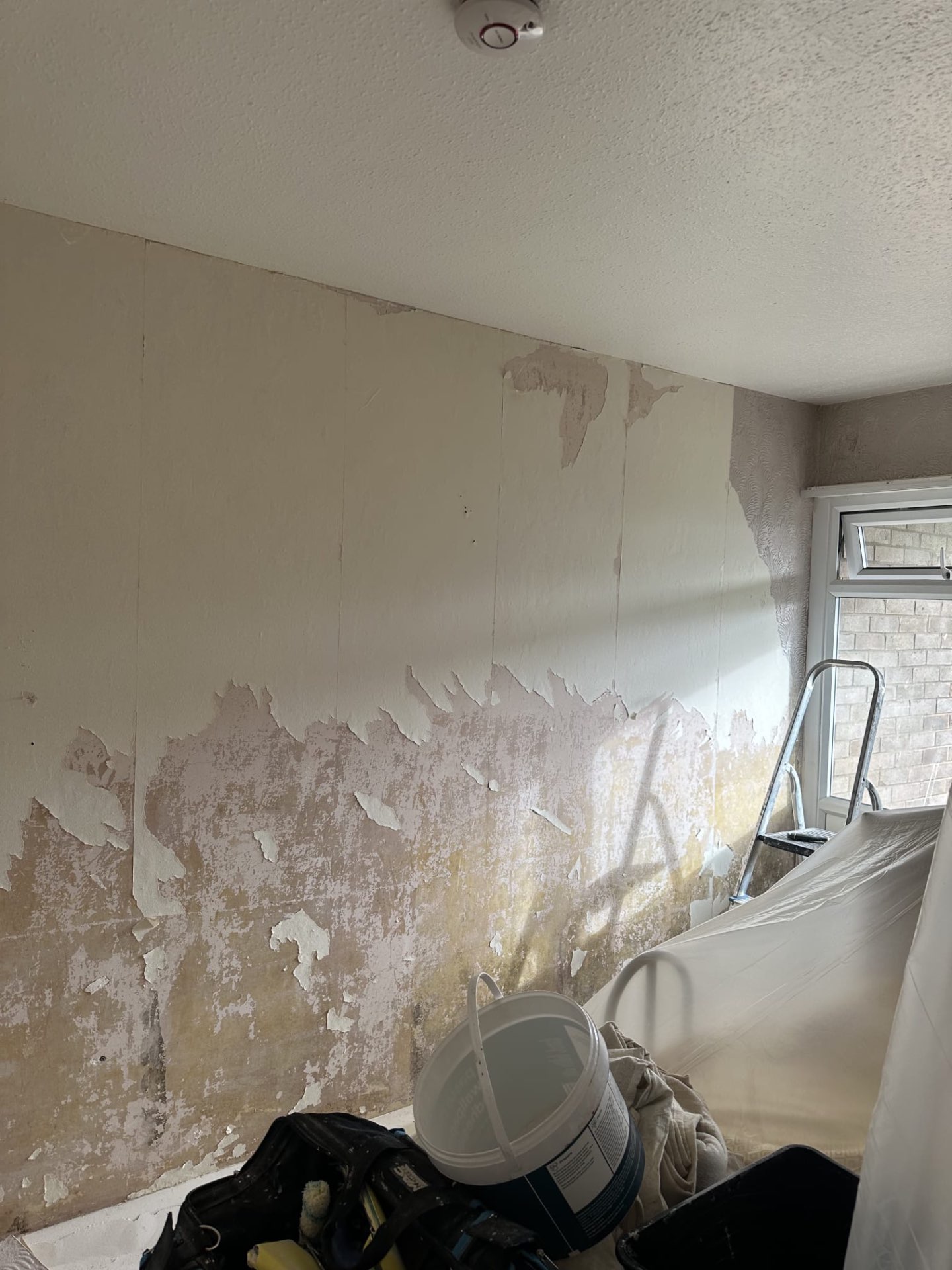 Wall stripped back and prepped, ready to paint